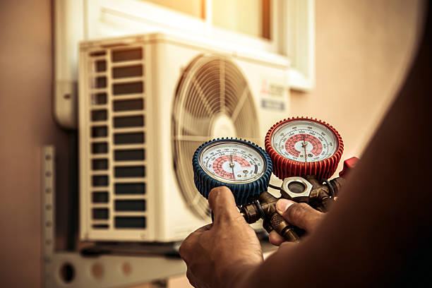 Professional Heat Pump Repair technician working in Warner Robins, GA